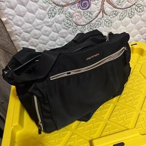 Tumi Black Messenger Bag with Gold Accents